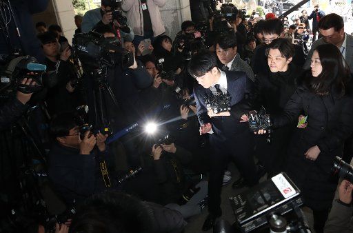 Seungri questioned on suspicion of sexual solicitation Seungri (C), a member of K-pop boy band BIGBANG, is surrounded by reporters as he enters the Seoul Metropolitan Police Agency in the capital on March 14, 2019, for questioning on suspicions that he solicited sexual favors for his business partners. The singer, whose real name is Lee Seung-hyun, allegedly arranged sex services for potential investors. A deeper probe has since uncovered suspicions of drug abuse, rape and collusion with district police. (Yonhap)\/2019-03-14 15:03:20\/ 