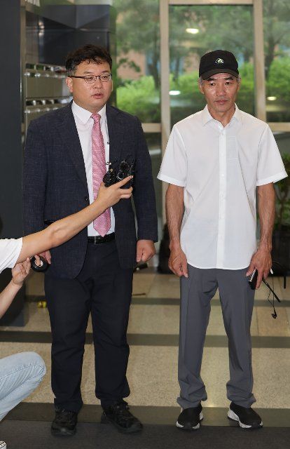 Brother of official killed by N.K. meets U.N. rights rapporteur Lee Rae-jin (L), the elder brother of Dae-joon, a South Korean fisheries ministry official shot to death by North Korean soldiers while drifting in waters in the West Sea in September 2020, along with his lawyer, Kim Ki-yoon, speaks to reporters prior to his meeting with Tomas Ojea Quintana, the U.N. special rapporteur on human rights in North Korea, at the Seoul office of the United Nations High Commissioner for Human Rights on June 28, 2022, to ask for international support in revealing the truth behind his brother\