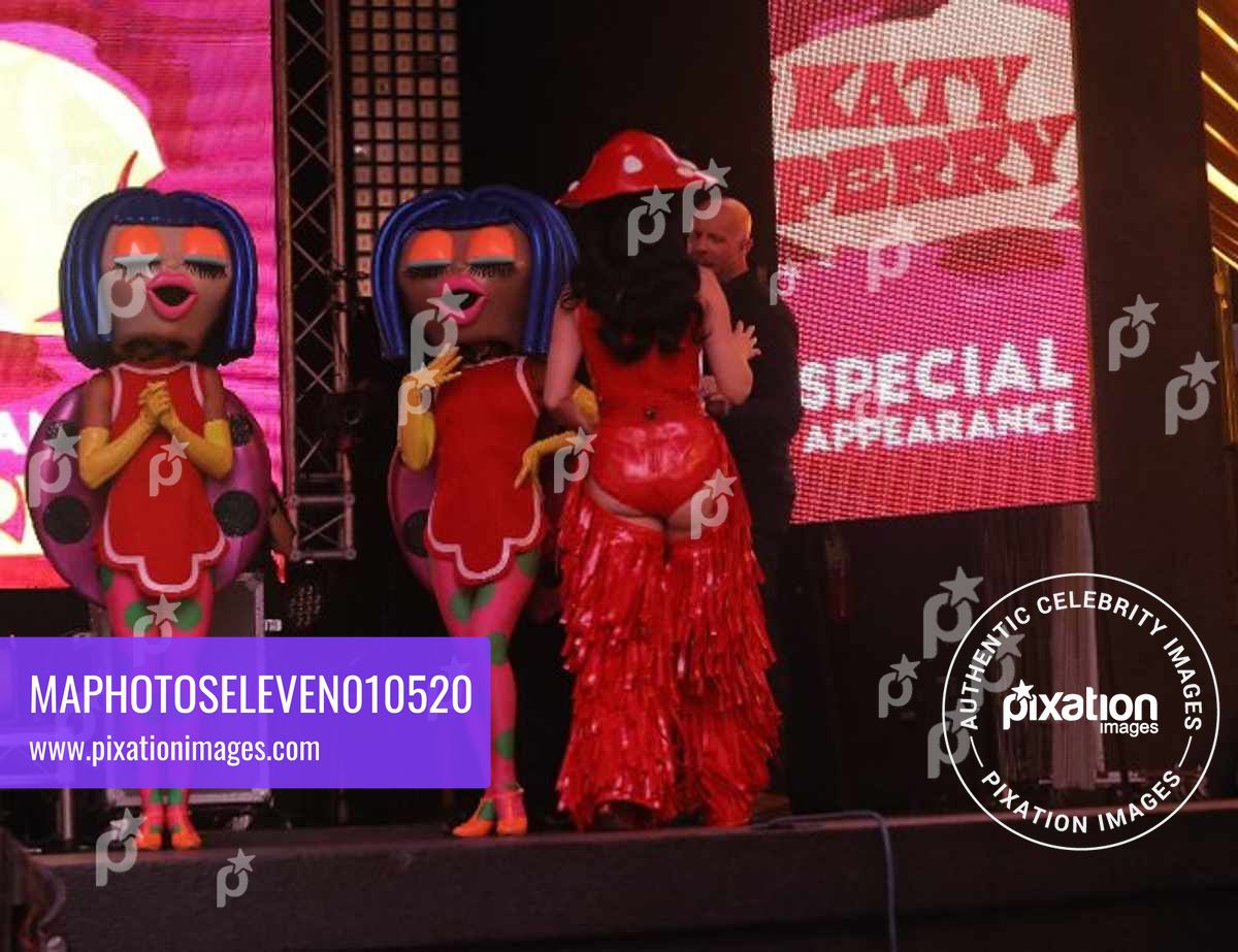 Katy Perry greets her adoring fans as she wears red leather outfit after performing on Freemont Street to celebrate her new jumbotron light show in Las Vegas