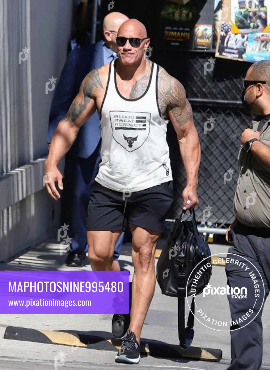 Dwyane Johnson AKA The Rock is seen arriving with his big guns show to Jimmy Kimmel - Dwayne Johnson