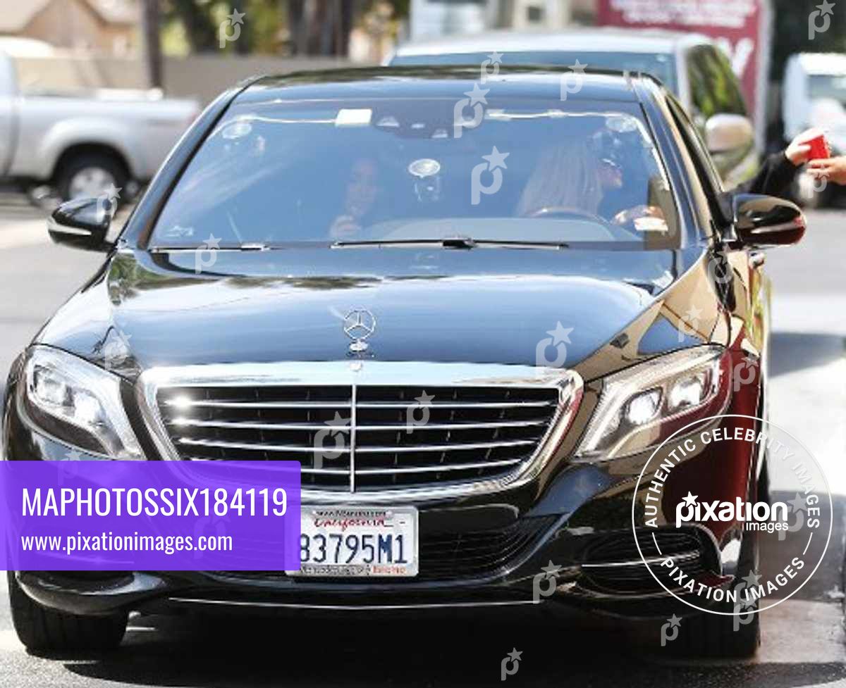 Kim Kardashian and Kourtney Kardashian filming KUWTK in Los Angeles