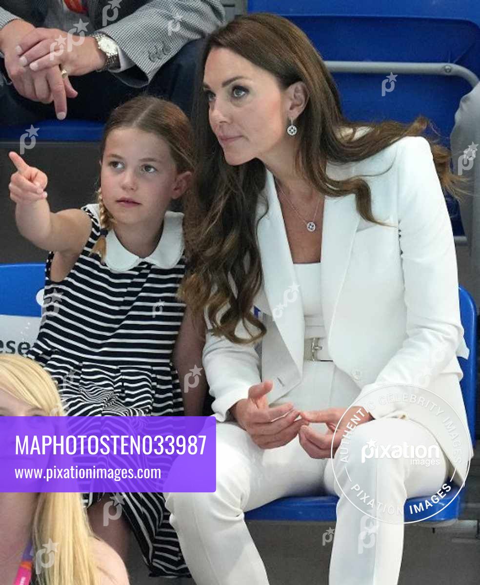 The Duke and Duchess of Cambridge and Princess Charlotte watch the Commonwealth Games Swimming