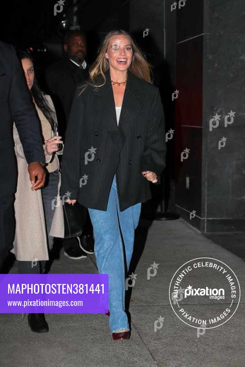 Margot Robbie is all smiling as she is seen leaving Babylon Q&A in New York City