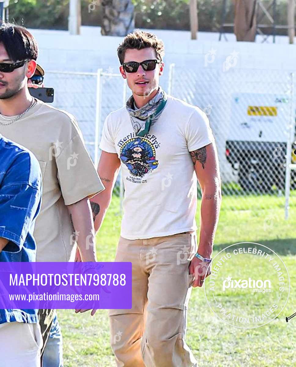Shawn Mendes looks fashionably cool while attending the Coachella Music & Arts Festival in Indio, CA.
