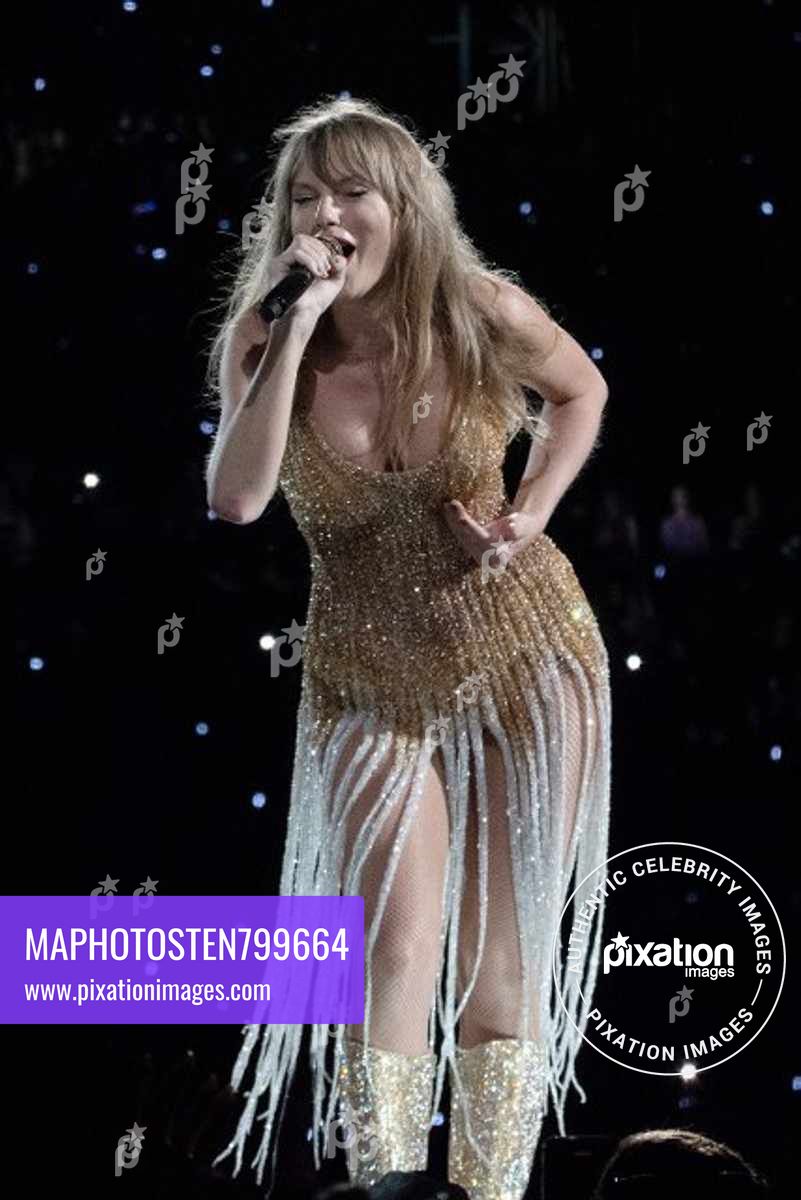 Taylor Swift delights her legion of fans as she takes to the stage in a staggering number of sparkling outfit changes during her Eras Tour stop in Tampa, Florida