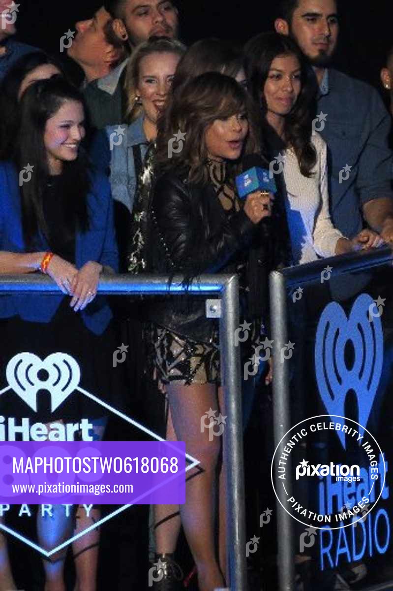 Paula Abdul shows off her long legs in a short dress as she hosts I heart 80's concert in LA